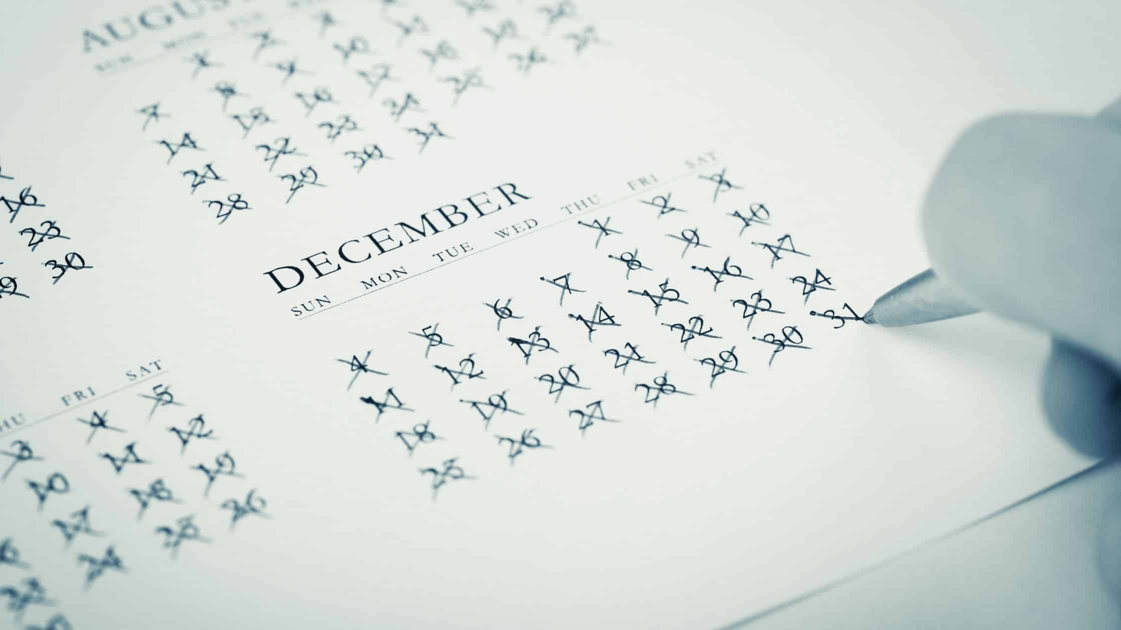 How to end the year strong: A December calendar showing crossed-off dates, symbolizing end-of-year planning and goal completion.